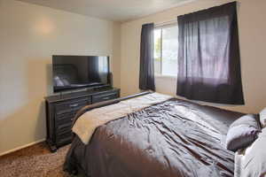 Bedroom featuring carpet flooring