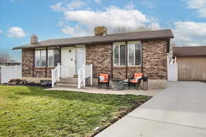 Ranch-style home with. Brand new cement driveway and front patio