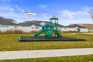 Playground and open space directly behind the home