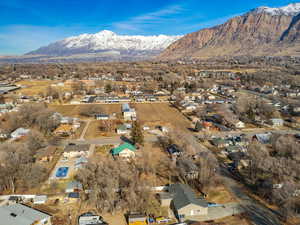 Birds eye view of property with a mountain view