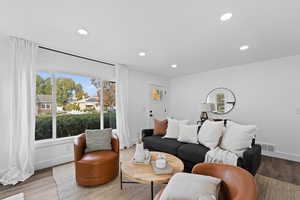 Living room featuring hardwood / wood-style floors