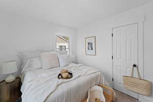 Bedroom featuring carpet