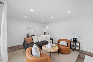 Living room featuring wood-type flooring