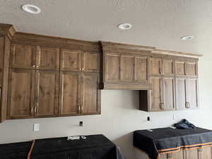 Kitchen with a textured ceiling