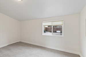 Smaller main floor bedroom, located off family room