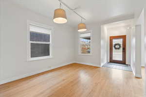 Entrance foyer featuring light hardwood flooring