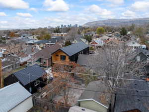 Aerial view of back of property with a view of downtown