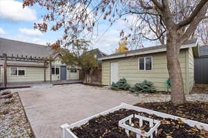 Rear view of property with a patio