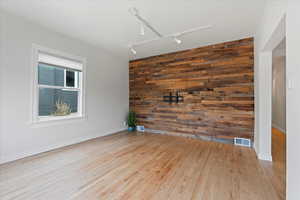 Front living room with reclaimed wood accent wall