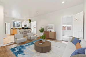 Family room with lots of natural light, connected to the kitchen which makes it an excellent space for guests