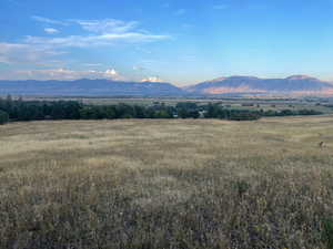 Property view of mountains with a rural view