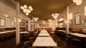 Dining area featuring a towering ceiling, dark wood-type flooring, and a notable chandelier