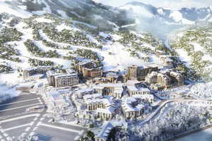 Snowy aerial view with a mountain view