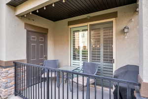 Property entrance featuring a balcony