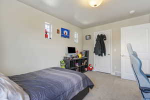 View of carpeted bedroom