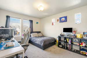 View of carpeted bedroom