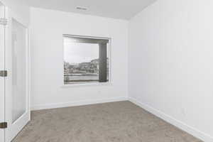 View of carpeted empty room