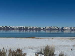 Property view of water with a mountain view