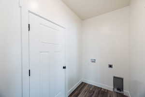 Washroom with electric dryer hookup, dark hardwood / wood-style floors, and washer hookup