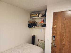 View of bedroom nook and entry door.