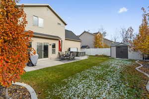 Fully landscaped and fenced yard. Fully automatic WiFi sprinkler system with automatic flowerbed drip system.