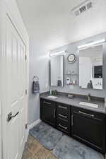 Primary bathroom includes Updated cabinets, 3cm Quartz countertop.