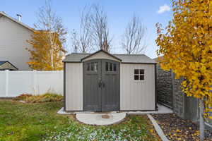 Large Lifetime shed with concrete pad.