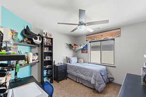 This bedroom features accent paint, plenty of space and a big closet.