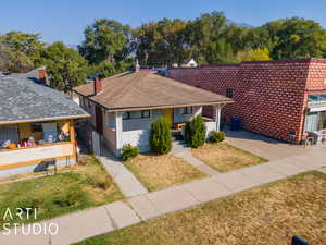 Ranch-style home with a front lawn