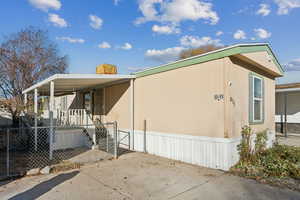 Exterior space with a carport