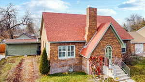 Tudor house featuring a garage