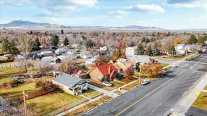 Birds eye view of property featuring a mountain view