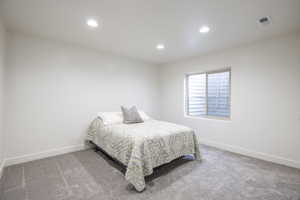 View of carpeted bedroom