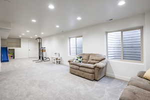 Living room with light colored carpet