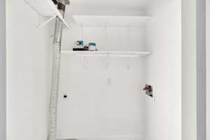 Clothes washing area with hookup for a washing machine and electric dryer hookup