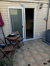 View of patio / terrace with central AC unit