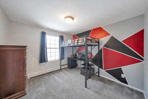 Bedroom featuring carpet flooring