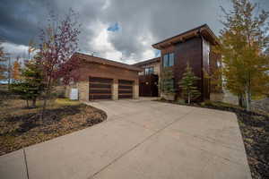 Contemporary home featuring a garage