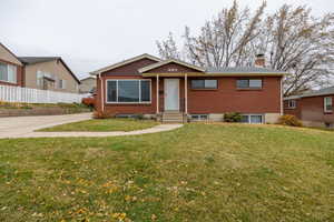 View of front of home with a front yard