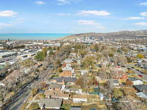 Birds eye view of property with a mountain view