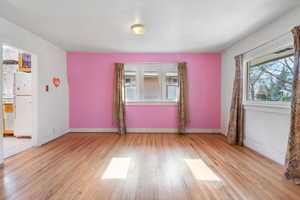 Spare room with light hardwood / wood-style floors