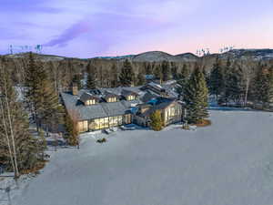 Snowy aerial view with a mountain view