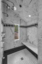 Bathroom featuring tiled shower