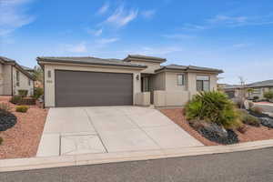 View of front of property with a garage