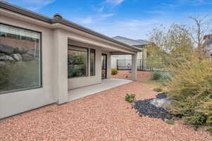 Rear view of property with a patio area