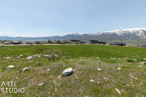 Property view of mountains featuring a rural view