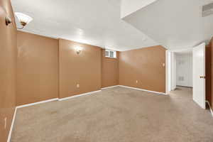 View of carpeted spare room