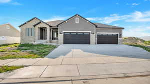 View of front of home featuring a garage