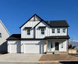 View of front of house featuring a 3-Bay garage