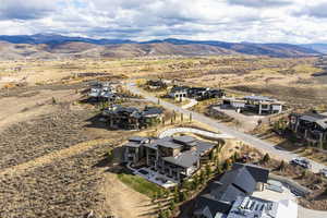 Birds eye view of property featuring a mountain view